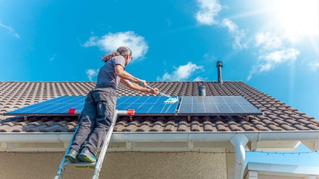 A man installing solar panels