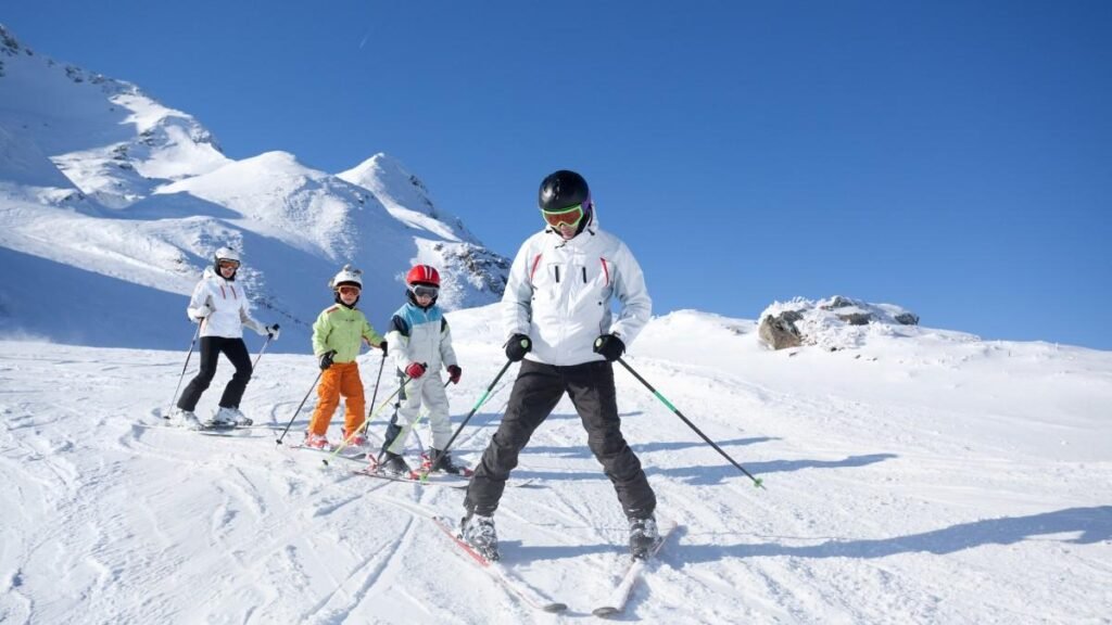 A group of four ice skiers