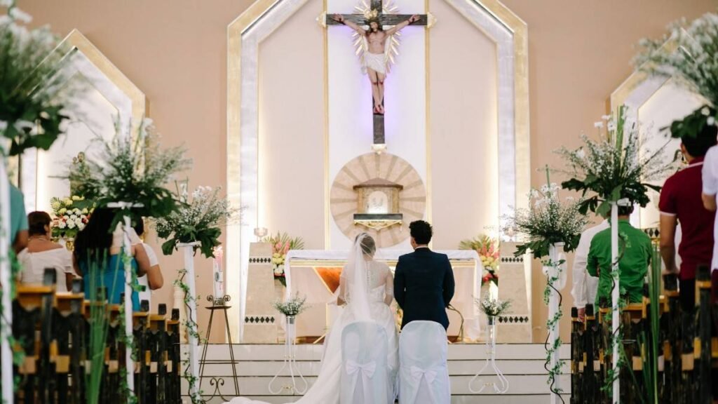 A bride and groom in church regarding wedding ceremony