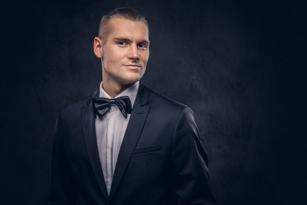 close up portrait handsome stylish man in black dress