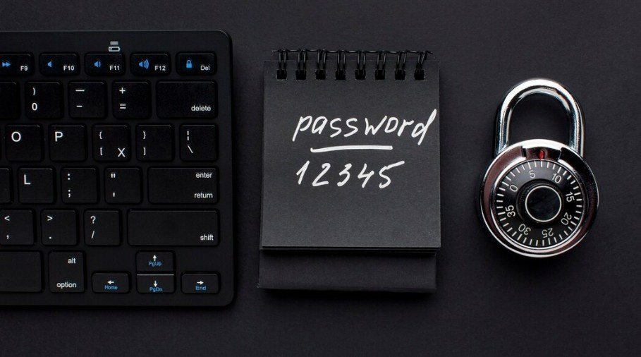 A keyboard a lock and aper on which password written