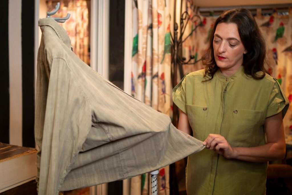 Woman cleaning clothing 