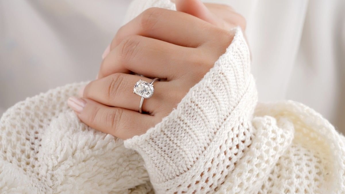 A woman hand wearing engagement ring