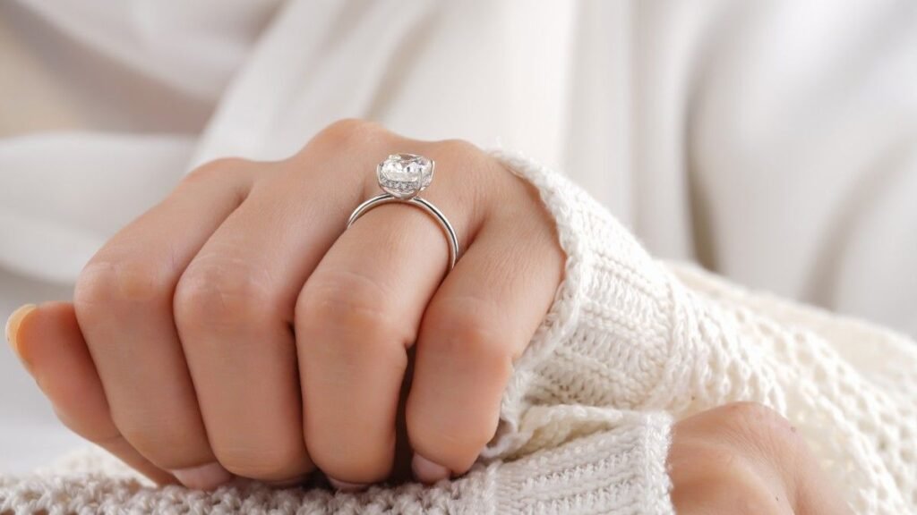 A woman hand with engagement ring