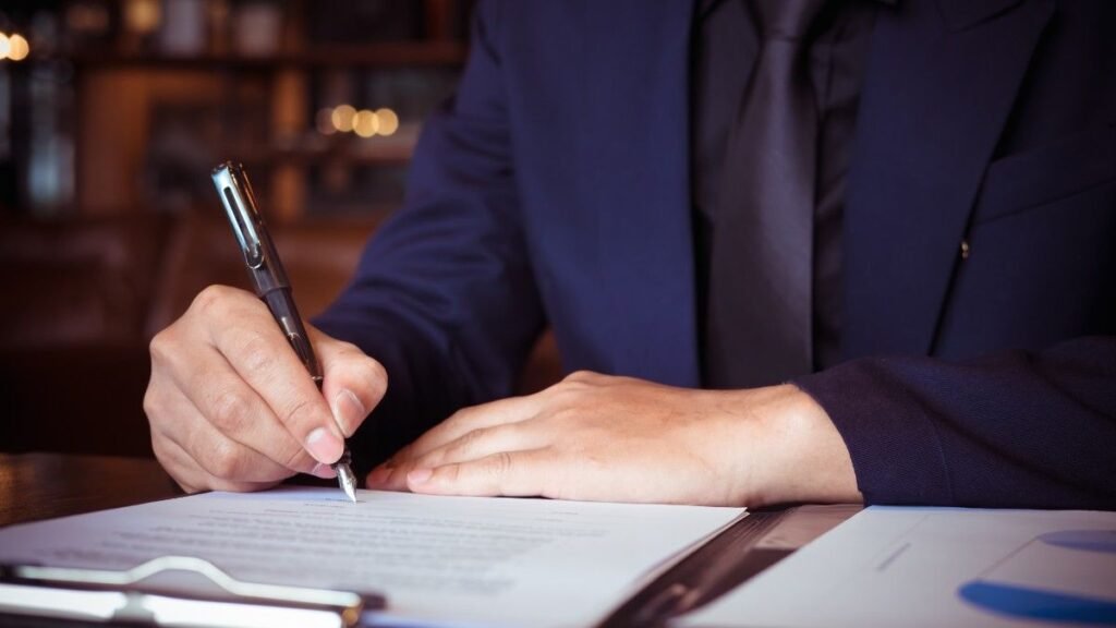 A person writing a complaint.